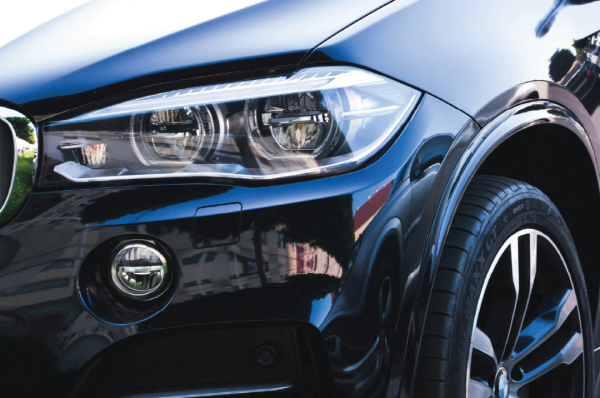 close up on a cars front corner
