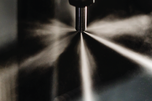 Fuel injector spraying