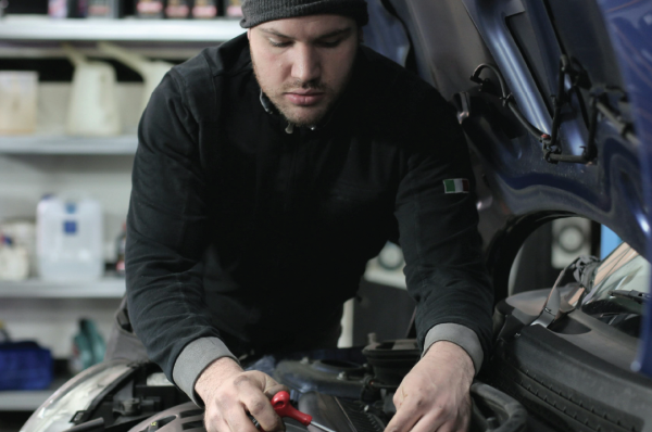 Someone working on an engine